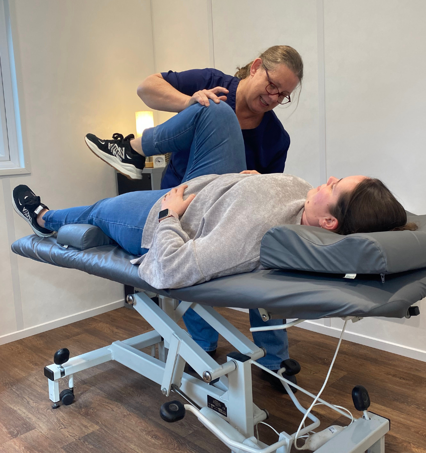 Jackie Gowland Osteopath mobilising a patients hip