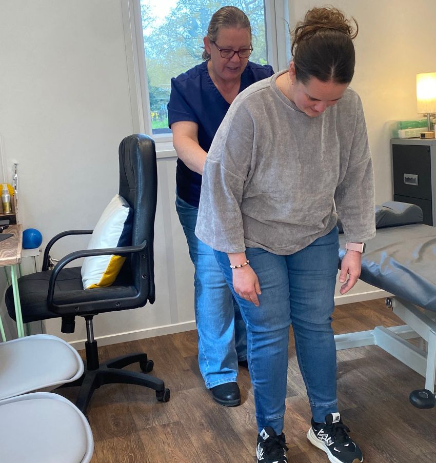 Jackie Gowland Osteopath assessing a patient